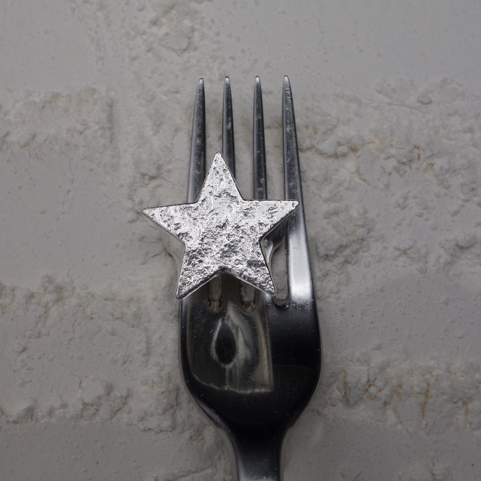 Star Ring – silberner Sternring auf einer Gabel